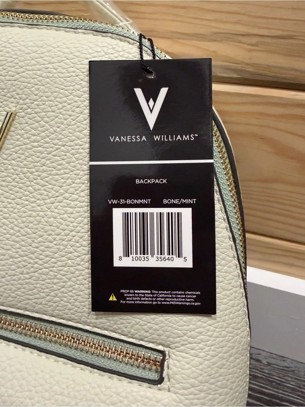 Vanessa Williams Bone color backpack purse, mint interior.